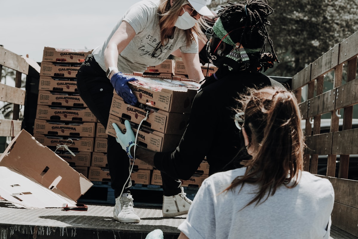 Community volunteers packing food and relief aid donations